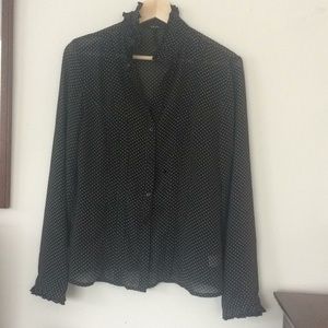 Sheer black button-up blouse with white polka dots